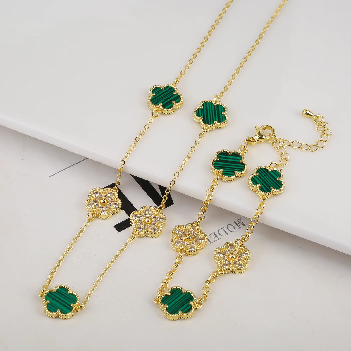 Hot Selling 18K Color Retention Electroplating New Plant Five Leaf Flower Micro Inlaid Zircon Set Necklace/Bracelet Women Clover