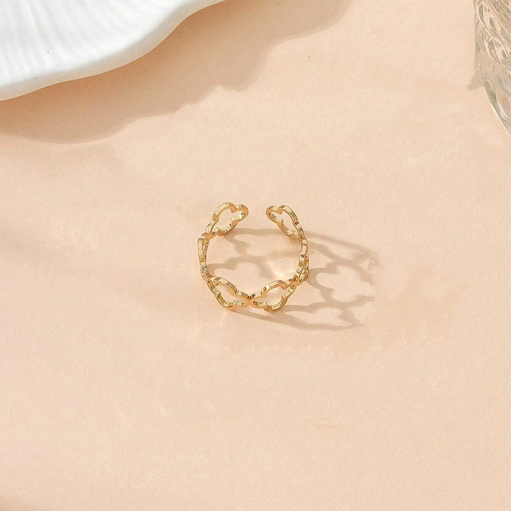 DOTIF Stainless Steel Lucky Hollow Four-Leaf Clover Ring Female Fashion Simple Opening Adjustable Finger Jewelry Party Gifts