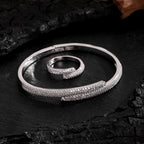 Parure de bijoux fantaisie tendance avec bracelet et bague en zircon exquis
