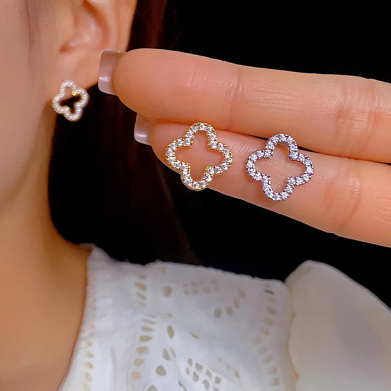 Nouvelles boucles d'oreilles simples et creuses en forme de trèfle à quatre feuilles pour femmes, tendance 2025, cadeau bijoux pour elle