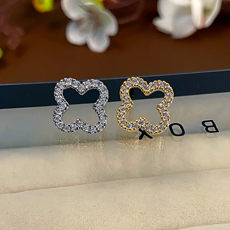 Nouvelles boucles d'oreilles simples et creuses en forme de trèfle à quatre feuilles pour femmes, tendance 2025, cadeau bijoux pour elle