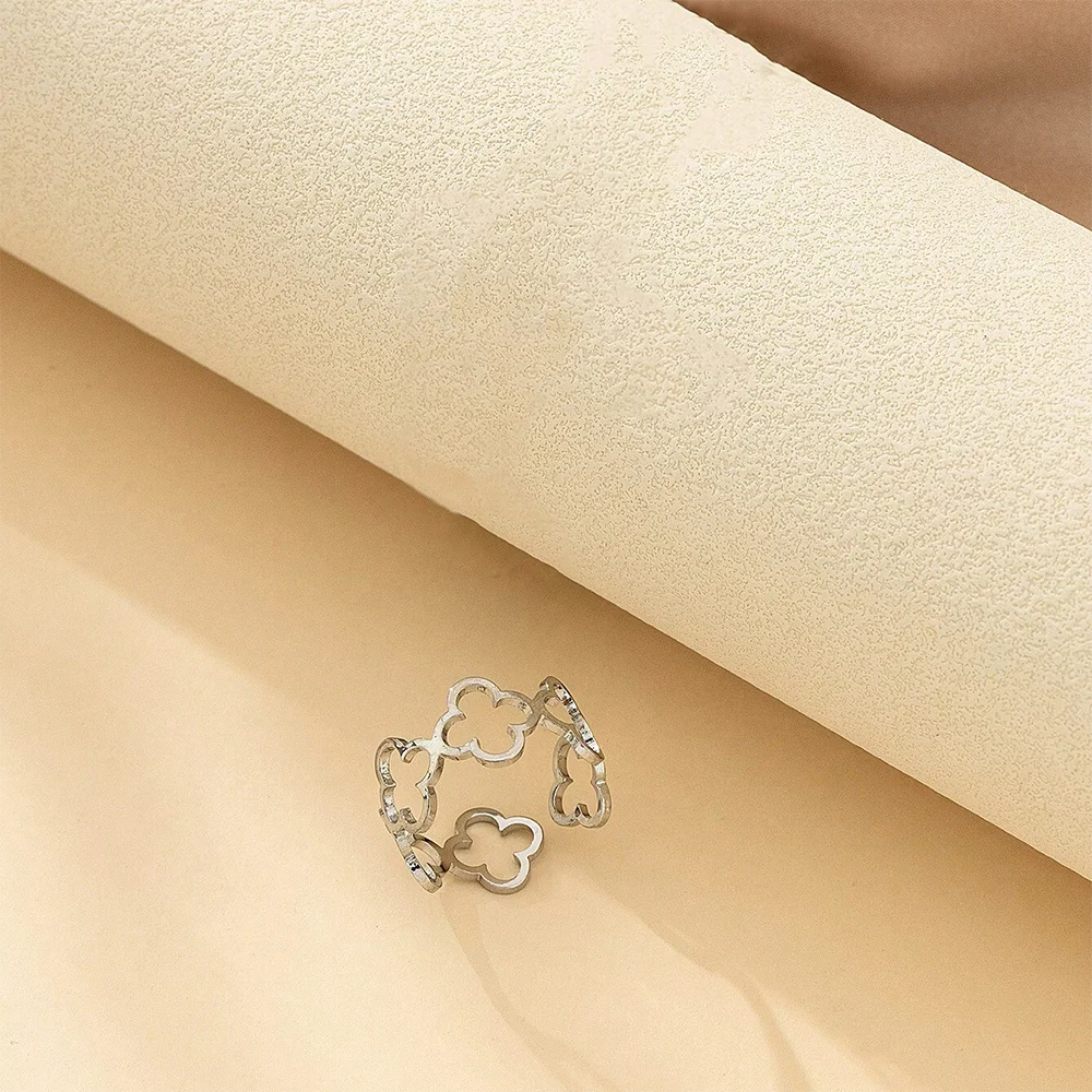 DOTIF Stainless Steel Lucky Hollow Four-Leaf Clover Ring Female Fashion Simple Opening Adjustable Finger Jewelry Party Gifts