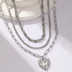 Colliers en acier inoxydable Pendentif cœur asymétrique Chaîne multicouche Collier atmosphérique pour femme Bijoux Cadeaux d'anniversaire Nouveautés