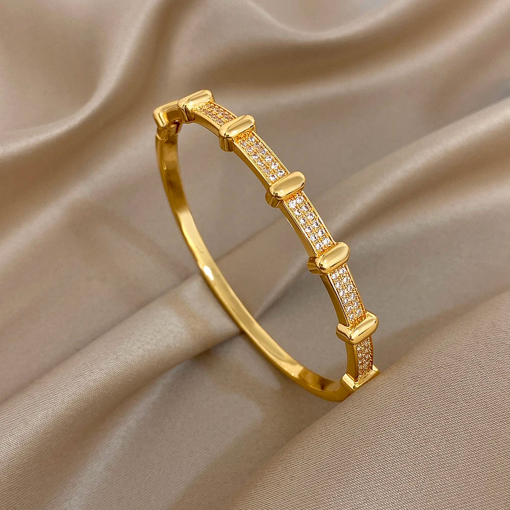 ChooseMe Looped Hollowed-Out Gold-Color Functional Buckle Cuff Bangle